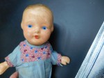 antique compo doll blue face